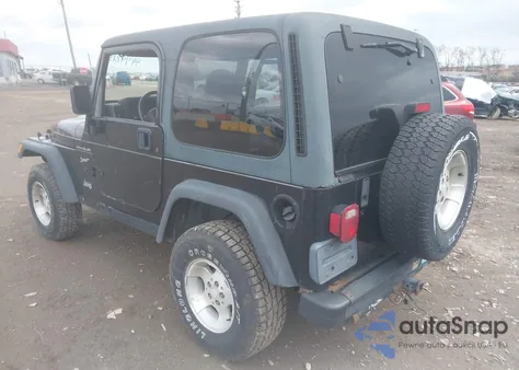 2002 Jeep Wrangler Sport z USA, uszkodzony, nr VIN 1J4FA49S32P735059